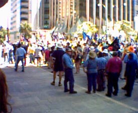 Marchers waiting ... at the traffic lights